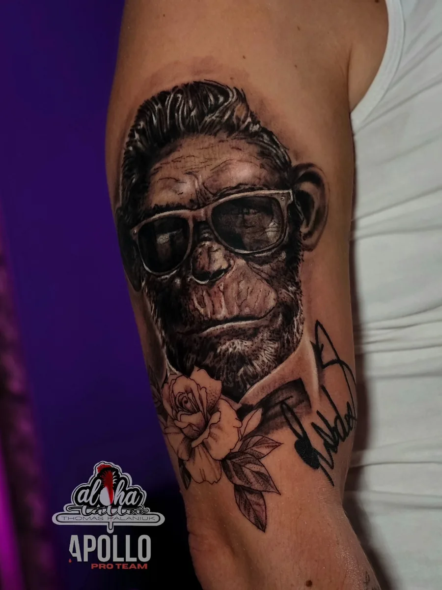 Tattoo by Thomas Palaniuk — Chimp portrait (black & grey)