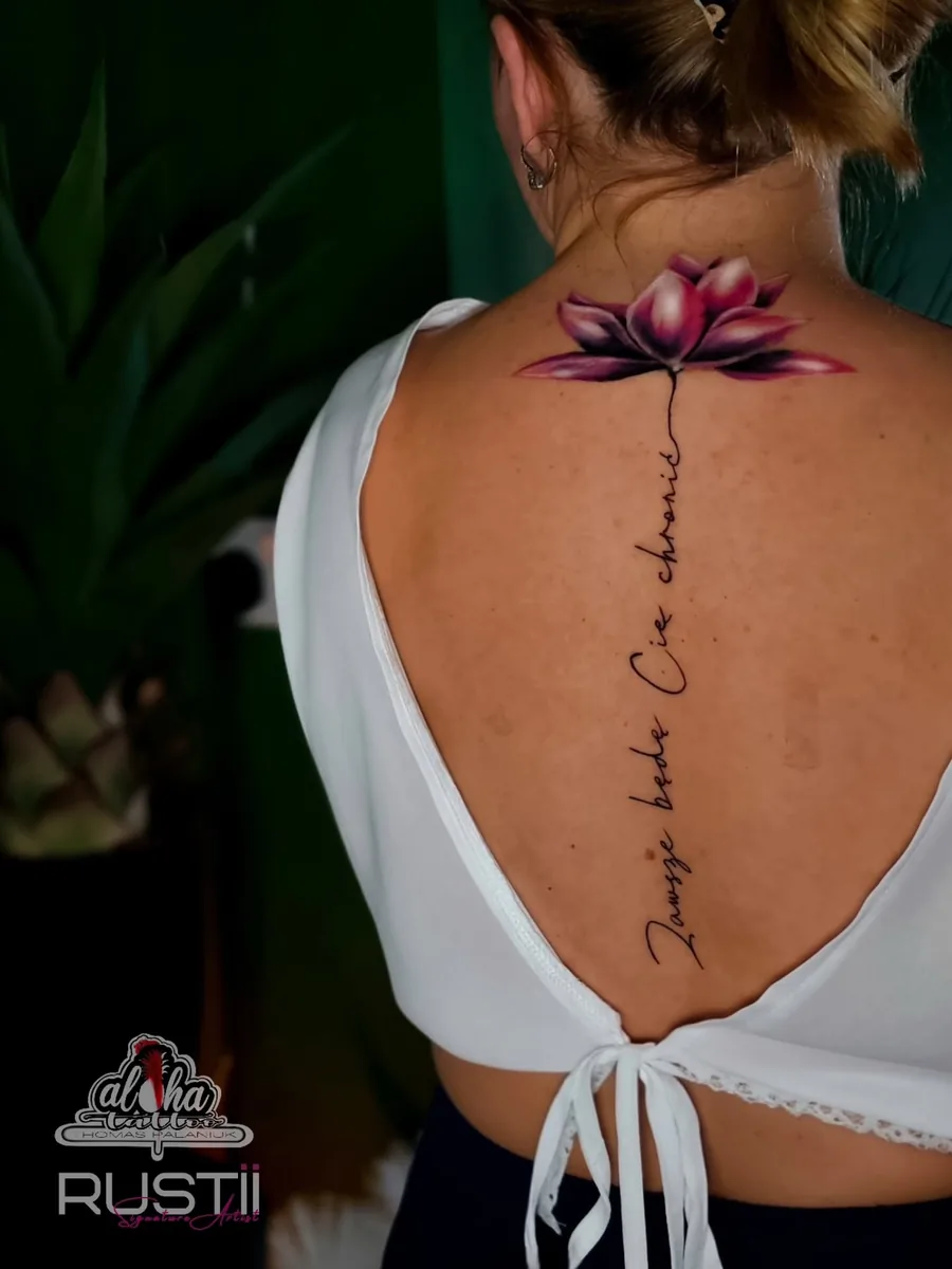 Tattoo by Thomas Palaniuk — Lotus spine piece (fine line)